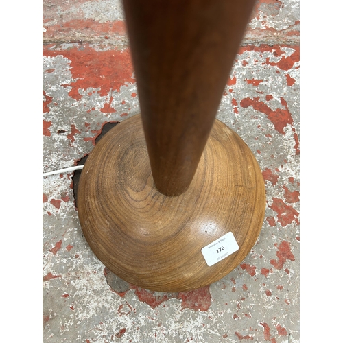 176 - A mid 20th century teak standard lamp - approx. 121cm high