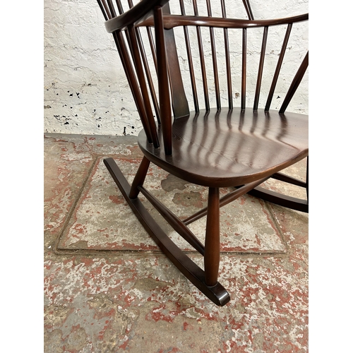 182 - An Ercol dark elm and beech Chairmakers rocking chair - approx. 102cm high x 65cm wide x 75cm deep