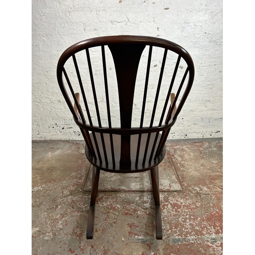 182 - An Ercol dark elm and beech Chairmakers rocking chair - approx. 102cm high x 65cm wide x 75cm deep