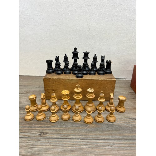 386 - Two vintage complete carved boxwood and ebony chess sets