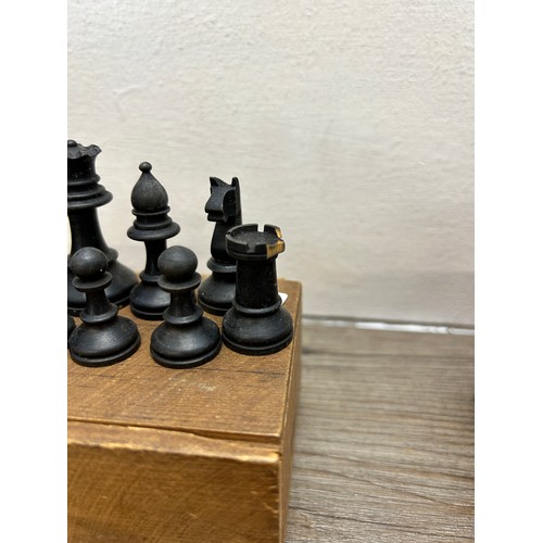 386 - Two vintage complete carved boxwood and ebony chess sets