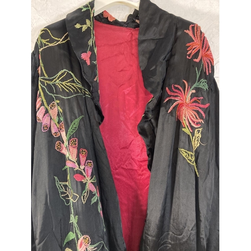 399 - A vintage Japanese embroidered silk kimono with floral and peacock design