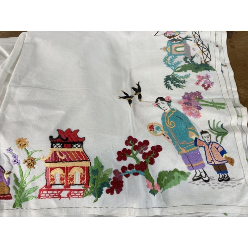 485 - A large collection of vintage embroidered linen