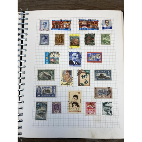 488 - A stamp album containing a collection of worldwide stamps