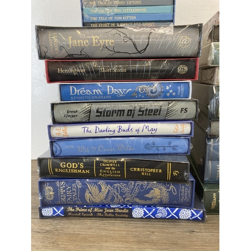 512 - A large collection of sealed Folio Society books to include The Wind In The Willows, Animal Farm, Gr... 