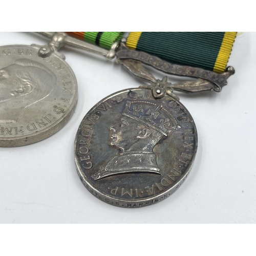 2358 - A British medal group comprising WWI war medal presented to 306227 Pte. G. Harrison Lan. Fus., WWI V... 