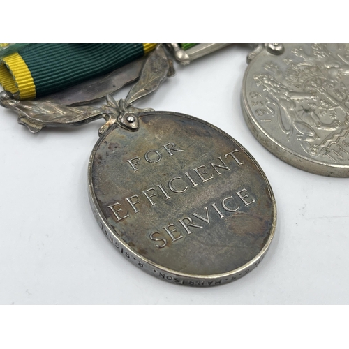 2358 - A British medal group comprising WWI war medal presented to 306227 Pte. G. Harrison Lan. Fus., WWI V... 