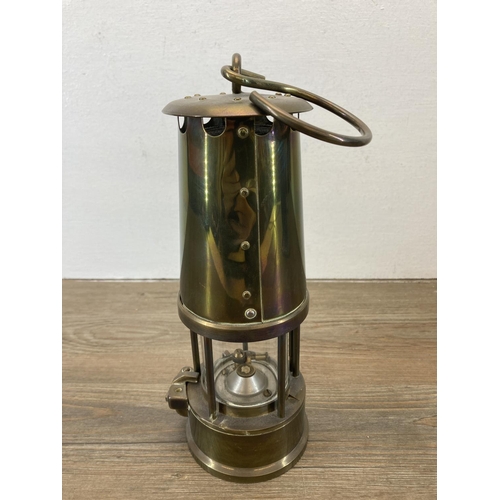 544 - A vintage Protector Lamp & Lighting Co Ltd. Type 6 brass miner's lamp