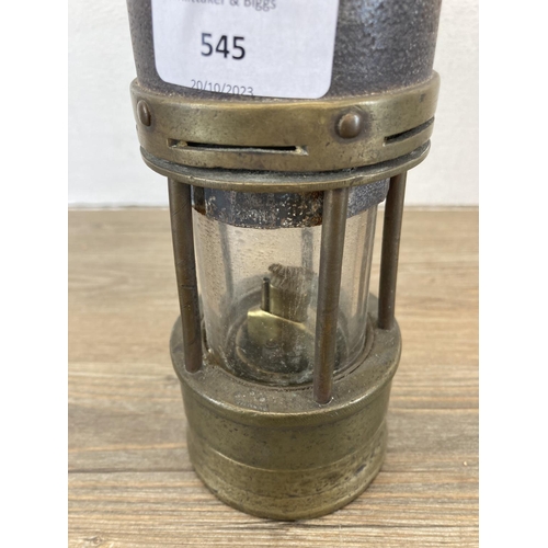 545 - An antique Hailwoods Type 01 Improved brass miner's lamp - no. 1630 - approx. 26cm high