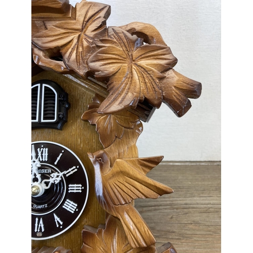 557 - A late 20th century Kaiser quartz cuckoo clock