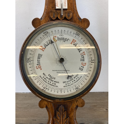 586 - A 19th century Nicholson & Cartner of Carlisle carved oak barometer - approx. 82cm high