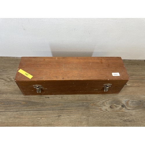 594 - A vintage teak cased British Indicators Ltd, 