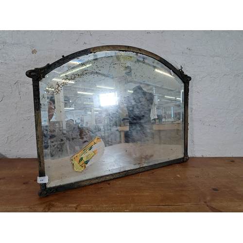 218 - An early 20th century brass framed bevelled edge wall mirror - approx. 54cm high x 72cm wide