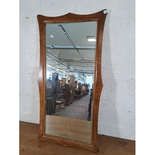 221 - A vintage oak framed bevelled edge wall mirror - approx. 106cm high x 54cm wide