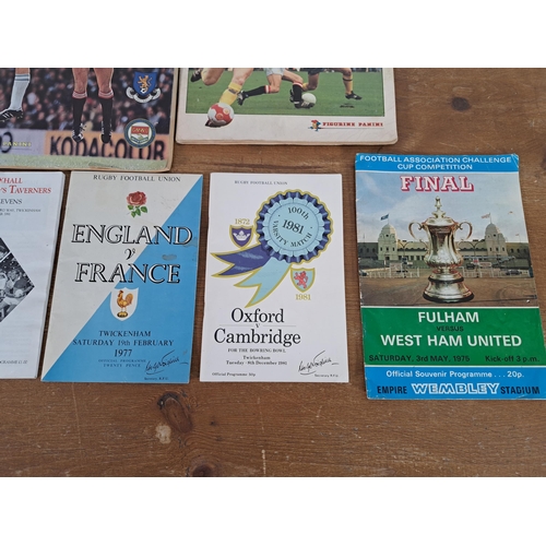 518 - A collection of football and rugby memorablia