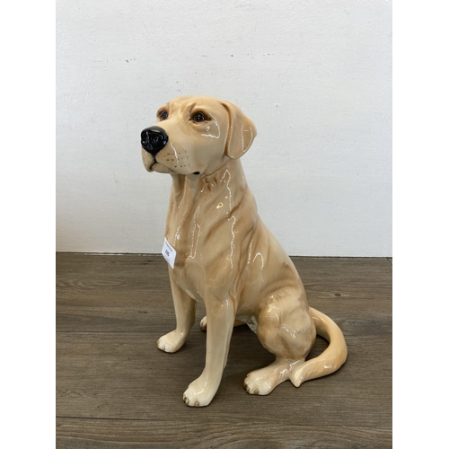 235 - A Beswick no.2314 fireside Labrador figurine - approx. 33cm high