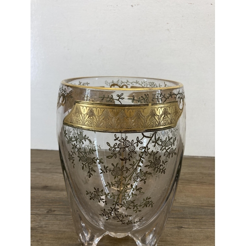 250 - An etched and gilded glass tri footed vase - approx. 23cm high x 14cm diameter