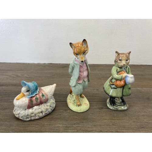 261 - Six Beatrix Potter figurines, three Royal Albert and three Beswick