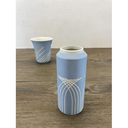 262 - Three Wedgwood Symmetry pattern pale blue Jasperware vases - largest approx. 12cm high