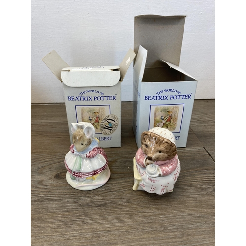 263 - Nine ceramic and glass items to include four boxed Royal Albert Beatrix Potter figurines, boxed Wate... 