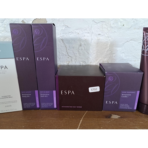 2390 - A collection of Espa beauty products to include restorative body oil, 200ml hydrating cleansing milk... 