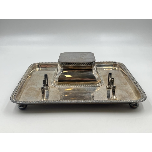 2222 - A George V Goldsmiths & Silversmiths Co. Ltd. hallmarked London silver desk tidy with inkwell and pe... 