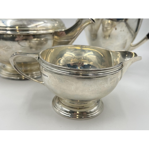 2224 - A Mappin & Webb hallmarked Sheffield silver three piece tea/coffee set, dated 1945 - approx. gross w... 