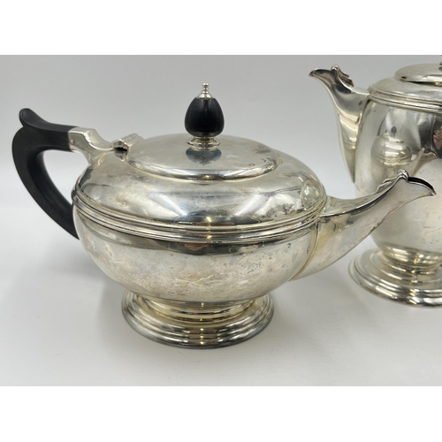 2224 - A Mappin & Webb hallmarked Sheffield silver three piece tea/coffee set, dated 1945 - approx. gross w... 