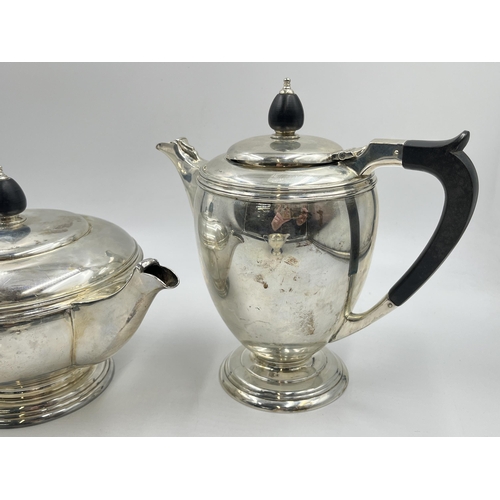 2224 - A Mappin & Webb hallmarked Sheffield silver three piece tea/coffee set, dated 1945 - approx. gross w... 