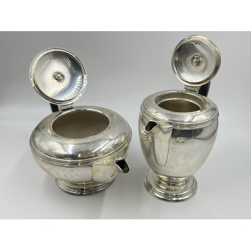 2224 - A Mappin & Webb hallmarked Sheffield silver three piece tea/coffee set, dated 1945 - approx. gross w... 