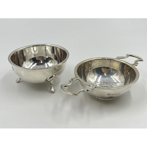 2231 - A hallmarked Birmingham silver tea strainer and bowl, dated 1964 - approx. gross weight 75g