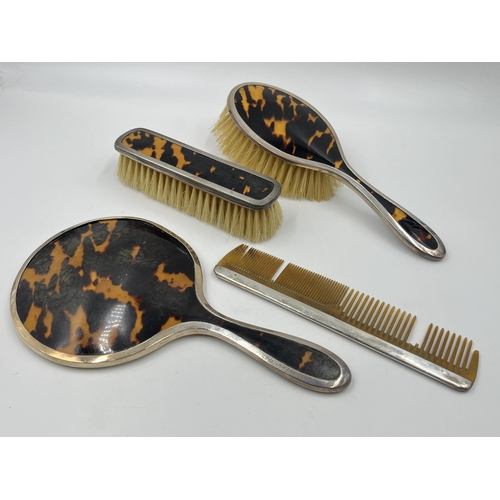 2236 - A hallmarked London silver and tortoiseshell four piece dressing table set, dated 1925 - approx. gro... 