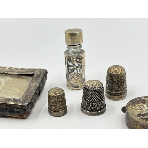 2237 - Five hallmarked sterling silver items to include scent bottle, foliate etched circular tape measure ... 