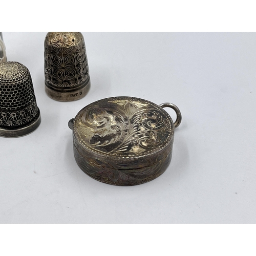 2237 - Five hallmarked sterling silver items to include scent bottle, foliate etched circular tape measure ... 