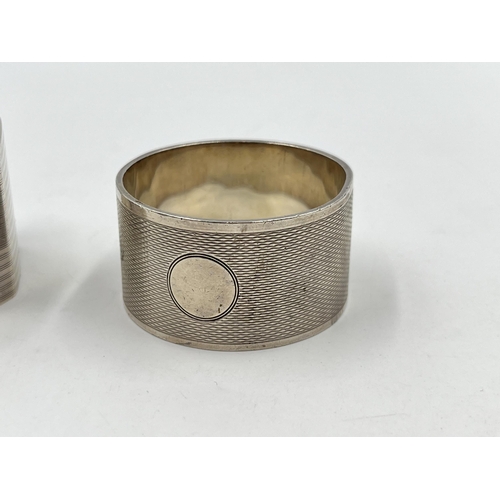 2241 - Two hallmarked Birmingham silver napkin rings - approx. gross weight 80g