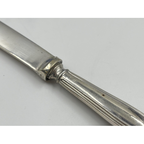 2242A - A cased set of six hallmarked Sheffield silver handled butter knives