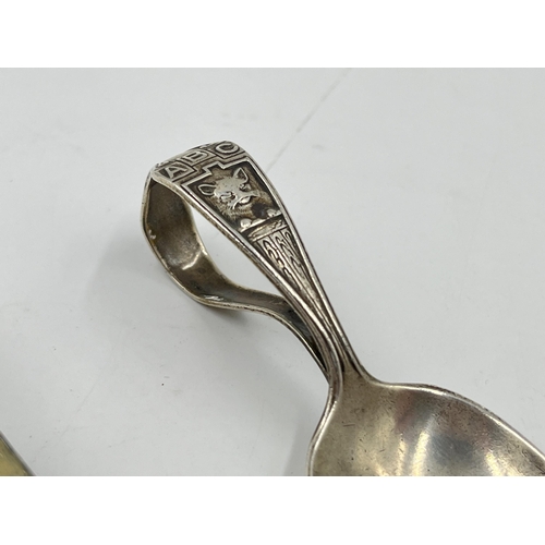 2252 - Two .925 silver baby spoons, one Chinese and one American - approx. gross weight 34g