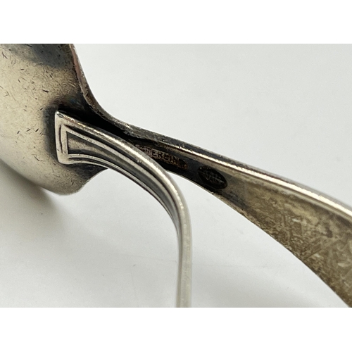 2252 - Two .925 silver baby spoons, one Chinese and one American - approx. gross weight 34g