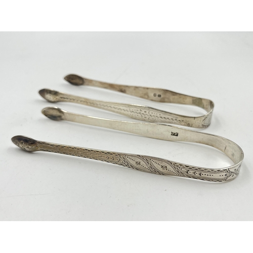 2258 - Two pairs of antique sterling silver sugar tongs - approx. gross weight 61g