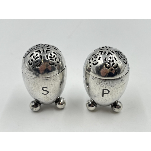 2275 - A pair of Victorian George Fox hallmarked London silver salt and pepper cellars, dated 1871 - approx... 