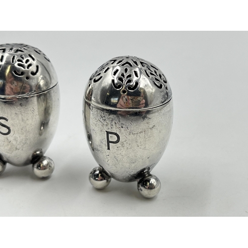 2275 - A pair of Victorian George Fox hallmarked London silver salt and pepper cellars, dated 1871 - approx... 