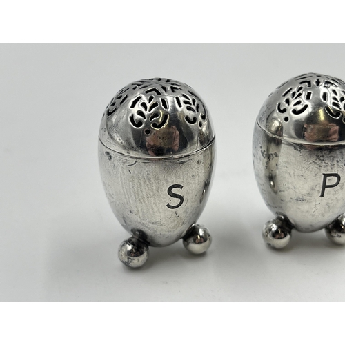 2275 - A pair of Victorian George Fox hallmarked London silver salt and pepper cellars, dated 1871 - approx... 