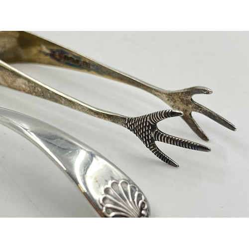 2286 - Two pieces of sterling silver, one spoon and one pair of sugar tongs - approx. 29g