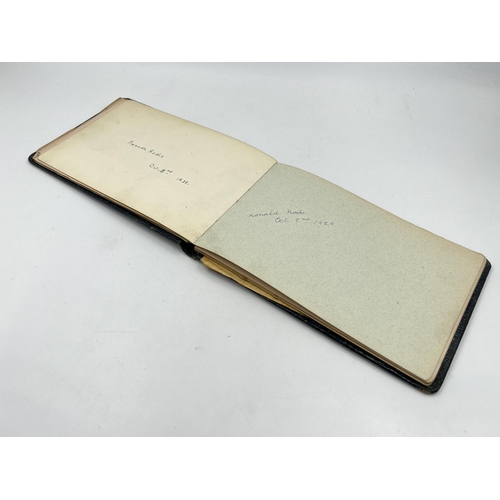 2345 - An early 20th century autograph album with contents