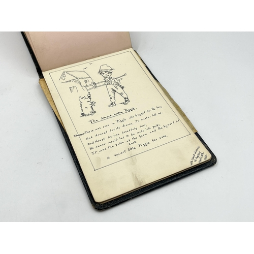 2345 - An early 20th century autograph album with contents