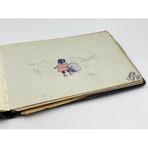 2345 - An early 20th century autograph album with contents