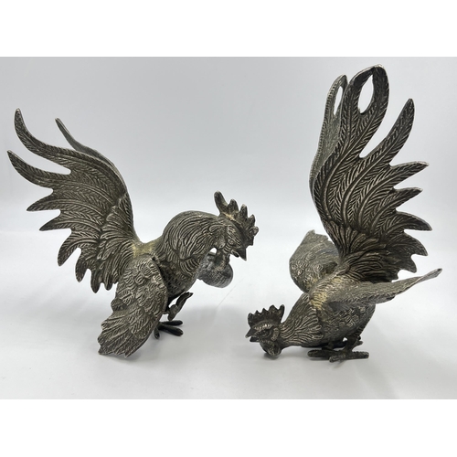 2345A - A pair of French metal fighting rooster figurines - largest approx. 18cm high