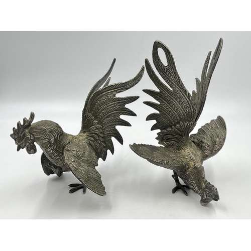 2345A - A pair of French metal fighting rooster figurines - largest approx. 18cm high