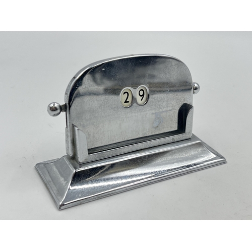 2347 - A mid 20th century chrome plated desk calendar - approx. 6cm high x 9.5cm wide