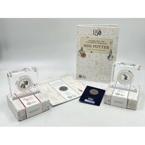 2366 - Five items, one Beatrix Potter 50p coin collector album containing five 50p coins, two boxed silver ... 